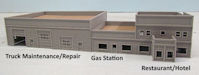 Download the .stl file and 3D Print your own Truck Stop with a Restaurant and Hotel N scale model for your model train set.