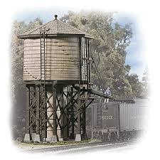 The Walthers Cornerstone Wood Water Tank kit is a typical wooden water tank as used on railroads from coast to coast. Constructed to satisfy steam locomotives' thirst for water, this fully assembled and decorated model adds instant steam-era realism to any layout. Appearing early in the 20th century, tanks like this were a fixture of railroad facilities until the last days of steam. It's perfect for busy engine terminals, small town yards and near smaller depots where engines were watered during the station stop. The Wood Water Tank kit features detailed wooden support timbers, positionable spout and ladder details. As shown the kit measures: 3-1/2 x 3-7/8 x 6-5/8" 8.7 x 9.6 x 16.5cm
 The Wood Water Tank will be a welcome addition to any servicing scene alongside other Cornerstone railroad maintenance structures.

Detailed wood support timbers
Positionable spout
Easy-to-build plastic kit
Molded in gray for easy painting
Perfect for steam-era railroads