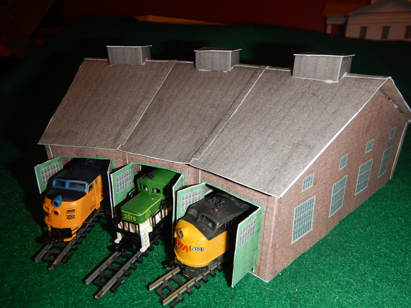 Building your own Free Printable N Scale 3 Bay Model Train Set Roundhouse for your model railroad. Free printable train set structures N Scale 3 Bay Mode Roundhouse. Print your own N Scale 3 Bay Model Train Set Roundhouse with a free PDF file download molding enjoyment.