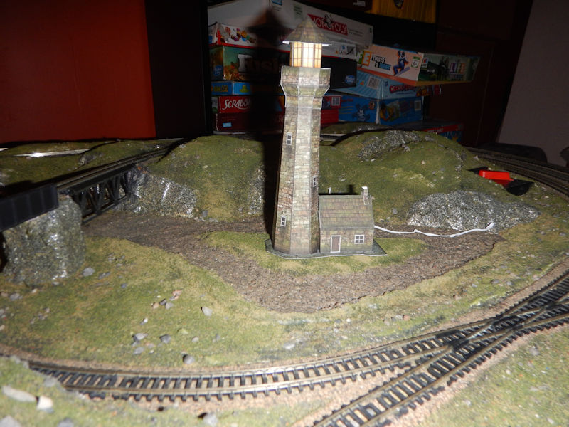 This free PDF printable n scale stone lighthouse templates that you cut out and fold to build your n scale stone lighthouse models, and includes instructions for folding your n scale stone lighthouse models. Build your own structures with krafttrains.com for your n scale model train set stone lighthouse.