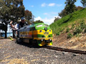 The Altona Miniature Railway (AMR) is a hobby club run by members that provide miniature train rides on scaled steam and diesel engines (5″ and 7 1/4″ gauge), over our 1.5 km length track in Altona Australia. Membership with Altona Miniature Railway is available to anyone who is interested in trains, scale model railroading, engineering, gardening or being involved in the local community. Altona Miniature Railway is a family friendly club that welcomes new members and their families.