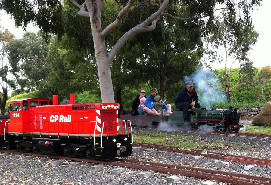 The Altona Miniature Railway (AMR) is a hobby club run by members that provide miniature train rides on scaled steam and diesel engines (5″ and 7 1/4″ gauge), over our 1.5 km length track in Altona Australia. Membership with Altona Miniature Railway is available to anyone who is interested in trains, scale model railroading, engineering, gardening or being involved in the local community. Altona Miniature Railway is a family friendly club that welcomes new members and their families. 