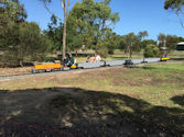 The Altona Miniature Railway (AMR) is a hobby club run by members that provide miniature train rides on scaled steam and diesel engines (5″ and 7 1/4″ gauge), over our 1.5 km length track in Altona Australia. Membership with Altona Miniature Railway is available to anyone who is interested in trains, scale model railroading, engineering, gardening or being involved in the local community. Altona Miniature Railway is a family friendly club that welcomes new members and their families.