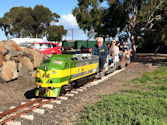 The Altona Miniature Railway (AMR) is a hobby club run by members that provide miniature train rides on scaled steam and diesel engines (5″ and 7 1/4″ gauge), over our 1.5 km length track in Altona Australia. Membership with Altona Miniature Railway is available to anyone who is interested in trains, scale model railroading, engineering, gardening or being involved in the local community. Altona Miniature Railway is a family friendly club that welcomes new members and their families.