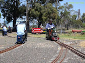 The Altona Miniature Railway (AMR) is a hobby club run by members that provide miniature train rides on scaled steam and diesel engines (5″ and 7 1/4″ gauge), over our 1.5 km length track in Altona Australia. Membership with Altona Miniature Railway is available to anyone who is interested in trains, scale model railroading, engineering, gardening or being involved in the local community. Altona Miniature Railway is a family friendly club that welcomes new members and their families.