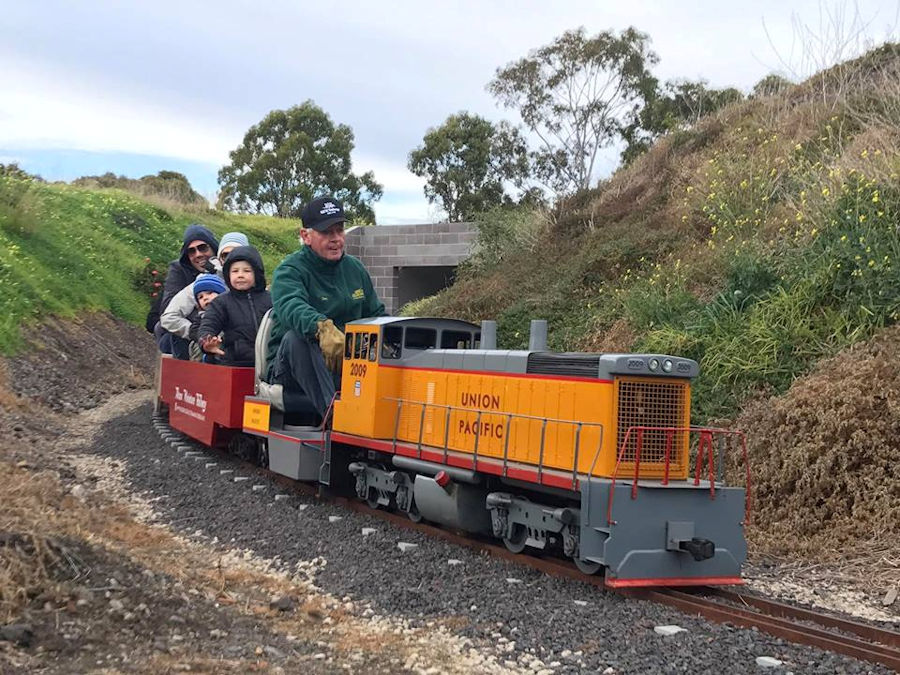 The Altona Miniature Railway (AMR) is a hobby club run by members that provide miniature train rides on scaled steam and diesel engines (5″ and 7 1/4″ gauge), over our 1.5 km length track in Altona Australia. Membership with Altona Miniature Railway is available to anyone who is interested in trains, scale model railroading, engineering, gardening or being involved in the local community. Altona Miniature Railway is a family friendly club that welcomes new members and their families. 