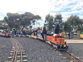 The Altona Miniature Railway (AMR) is a hobby club run by members that provide miniature train rides on scaled steam and diesel engines (5″ and 7 1/4″ gauge), over our 1.5 km length track in Altona Australia. Membership with Altona Miniature Railway is available to anyone who is interested in trains, scale model railroading, engineering, gardening or being involved in the local community. Altona Miniature Railway is a family friendly club that welcomes new members and their families.