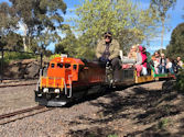 The Altona Miniature Railway (AMR) is a hobby club run by members that provide miniature train rides on scaled steam and diesel engines (5″ and 7 1/4″ gauge), over our 1.5 km length track in Altona Australia. Membership with Altona Miniature Railway is available to anyone who is interested in trains, scale model railroading, engineering, gardening or being involved in the local community. Altona Miniature Railway is a family friendly club that welcomes new members and their families.