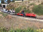 The Altona Miniature Railway (AMR) is a hobby club run by members that provide miniature train rides on scaled steam and diesel engines (5″ and 7 1/4″ gauge), over our 1.5 km length track in Altona Australia. Membership with Altona Miniature Railway is available to anyone who is interested in trains, scale model railroading, engineering, gardening or being involved in the local community. Altona Miniature Railway is a family friendly club that welcomes new members and their families.