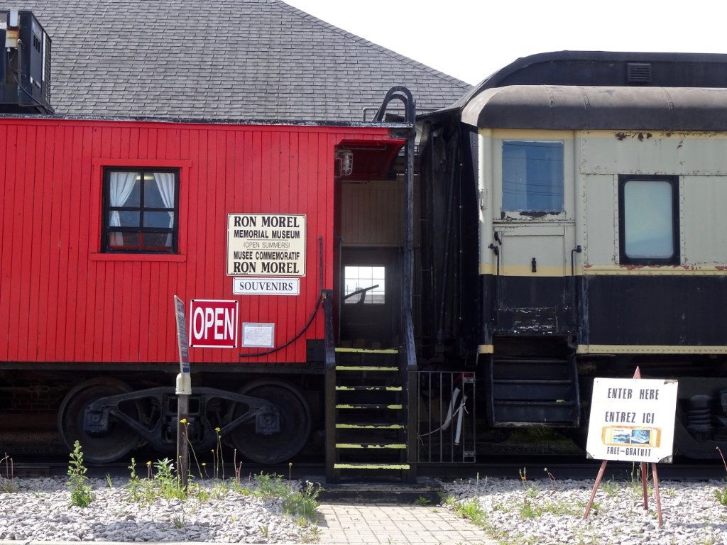 Welcome to the Ron Morel Memorial Museum in Kapuskasing Ontario Canada

This site's collection focuses on the Kapuskasing region from 1914 to the present. The museum is housed in two Canadian National Railway coaches, an engine and a caboose. There is a permanent exhibit on Kapuskasing's World War I internment camp ( www.cdli.ca/monuments/on/kapplaq.htm ), and new exhibits every season on various aspects of Kapuskasing. Working HO-gauge and N-gauge railway models are sure to delight young and older visitors alike.

The Ron Morel Memorial Museum, housed in locomotive #5107, was founded in 1971 by the late Ron Morel Sr. whose vision was to showcase two of his passions -local history and trains. The museum has something for everyone.
