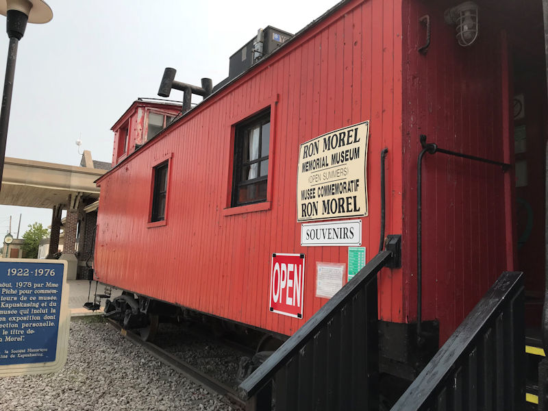 Welcome to the Ron Morel Memorial Museum in Kapuskasing Ontario Canada

This site's collection focuses on the Kapuskasing region from 1914 to the present. The museum is housed in two Canadian National Railway coaches, an engine and a caboose. There is a permanent exhibit on Kapuskasing's World War I internment camp ( www.cdli.ca/monuments/on/kapplaq.htm ), and new exhibits every season on various aspects of Kapuskasing. Working HO-gauge and N-gauge railway models are sure to delight young and older visitors alike.

The Ron Morel Memorial Museum, housed in locomotive #5107, was founded in 1971 by the late Ron Morel Sr. whose vision was to showcase two of his passions -local history and trains. The museum has something for everyone.
