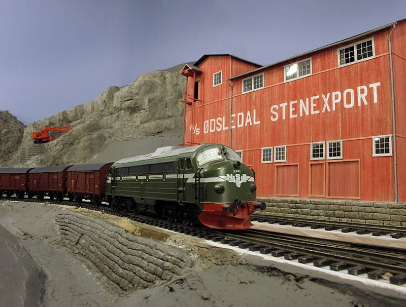 View the Trondhjem Modelljernbaneklubb TMJK (Trondhjem Model railway club) picture gallery in Trondheim Norway and, See what the Trondhjem Modelljernbaneklubb has to offer in model railroading. Learn about the TMJK History, watch videos, see club photos, and upcoming event at the Trondhjem Modelljernbaneklubb TMJK in Trondheim Norway.