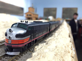 Welcome to the Los Angeles N-Scale Association, operators of East Valley Lines Model Railroad located since 1979 in the Travel Town Museum at Griffith Park. View pitchers of the East Valley Lines N Scale Model Railroad and see what they have done to their N scale layout. They operate one of the largest N-Scale layouts in the world. This is just a brief trip on the East Valley Lines' trackage. As you observe closely, there are lots of details to enjoy. This is truly a labor of love, involving countless hours, money and the talents of the many N-Scale modelers dedicated to the memory of great railroads. Brought to you to by www.krafttrains.com