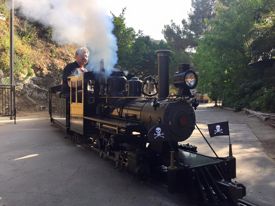 Welcome to the Los Angeles N-Scale Association, operators of East Valley Lines Model Railroad club located since 1979 in the Travel Town Museum at Griffith Los Angeles, California. View pitchers of the East Valley Lines N Scale Model Railroad club and see what they have done to their N scale layout. They operate one of the largest N-Scale layouts in the world. This is just a brief trip on the East Valley Lines' trackage. As you observe closely, there are lots of details to enjoy. This is truly a labor of love, involving countless hours, money and the talents of the many N-Scale modelers dedicated to the memory of great railroads. Brought to you to by www.krafttrains.com