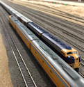 Welcome to the Los Angeles N-Scale Association, operators of East Valley Lines Model Railroad located since 1979 in the Travel Town Museum at Griffith Park. View pitchers of the East Valley Lines N Scale Model Railroad and see what they have done to their N scale layout. They operate one of the largest N-Scale layouts in the world. This is just a brief trip on the East Valley Lines' trackage. As you observe closely, there are lots of details to enjoy. This is truly a labor of love, involving countless hours, money and the talents of the many N-Scale modelers dedicated to the memory of great railroads. Brought to you to by www.krafttrains.com