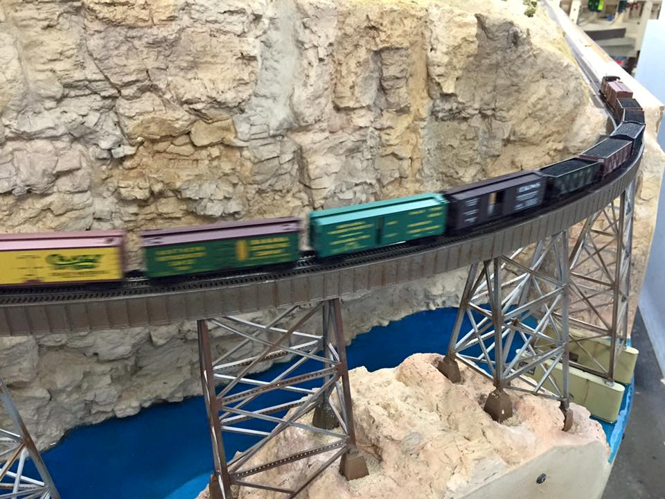 Welcome to the Los Angeles N-Scale Association, operators of East Valley Lines Model Railroad club located since 1979 in the Travel Town Museum at Griffith Los Angeles, California. View pitchers of the East Valley Lines N Scale Model Railroad club and see what they have done to their N scale layout. They operate one of the largest N-Scale layouts in the world. This is just a brief trip on the East Valley Lines' trackage. As you observe closely, there are lots of details to enjoy. This is truly a labor of love, involving countless hours, money and the talents of the many N-Scale modelers dedicated to the memory of great railroads. Brought to you to by www.krafttrains.com