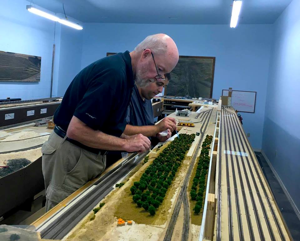 Welcome to the Los Angeles N-Scale Association, operators of East Valley Lines Model Railroad club located since 1979 in the Travel Town Museum at Griffith Los Angeles, California. View pitchers of the East Valley Lines N Scale Model Railroad club and see what they have done to their N scale layout. They operate one of the largest N-Scale layouts in the world. This is just a brief trip on the East Valley Lines' trackage. As you observe closely, there are lots of details to enjoy. This is truly a labor of love, involving countless hours, money and the talents of the many N-Scale modelers dedicated to the memory of great railroads. Brought to you to by www.krafttrains.com