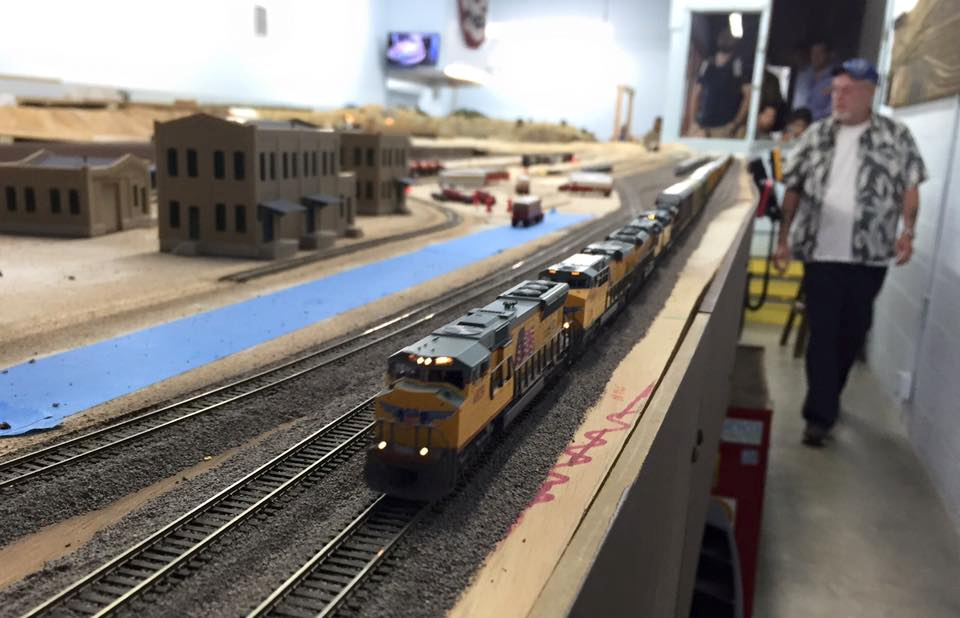 Welcome to the Los Angeles N-Scale Association, operators of East Valley Lines Model Railroad club located since 1979 in the Travel Town Museum at Griffith Los Angeles, California. View pitchers of the East Valley Lines N Scale Model Railroad club and see what they have done to their N scale layout. They operate one of the largest N-Scale layouts in the world. This is just a brief trip on the East Valley Lines' trackage. As you observe closely, there are lots of details to enjoy. This is truly a labor of love, involving countless hours, money and the talents of the many N-Scale modelers dedicated to the memory of great railroads. Brought to you to by www.krafttrains.com