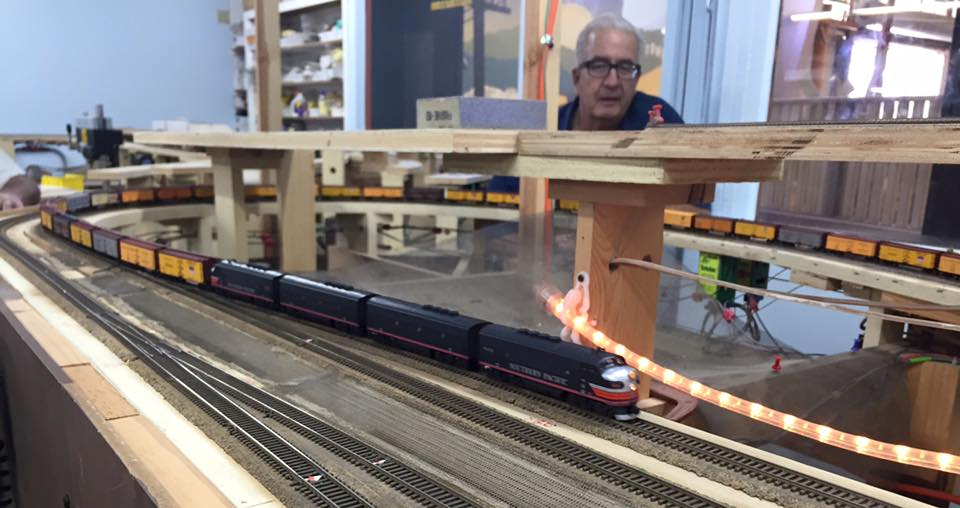 Welcome to the Los Angeles N-Scale Association, operators of East Valley Lines Model Railroad club located since 1979 in the Travel Town Museum at Griffith Los Angeles, California. View pitchers of the East Valley Lines N Scale Model Railroad club and see what they have done to their N scale layout. They operate one of the largest N-Scale layouts in the world. This is just a brief trip on the East Valley Lines' trackage. As you observe closely, there are lots of details to enjoy. This is truly a labor of love, involving countless hours, money and the talents of the many N-Scale modelers dedicated to the memory of great railroads. Brought to you to by www.krafttrains.com