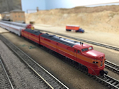 Welcome to the Los Angeles N-Scale Association, operators of East Valley Lines Model Railroad located since 1979 in the Travel Town Museum at Griffith Park. View pitchers of the East Valley Lines N Scale Model Railroad and see what they have done to their N scale layout. They operate one of the largest N-Scale layouts in the world. This is just a brief trip on the East Valley Lines' trackage. As you observe closely, there are lots of details to enjoy. This is truly a labor of love, involving countless hours, money and the talents of the many N-Scale modelers dedicated to the memory of great railroads. Brought to you to by www.krafttrains.com