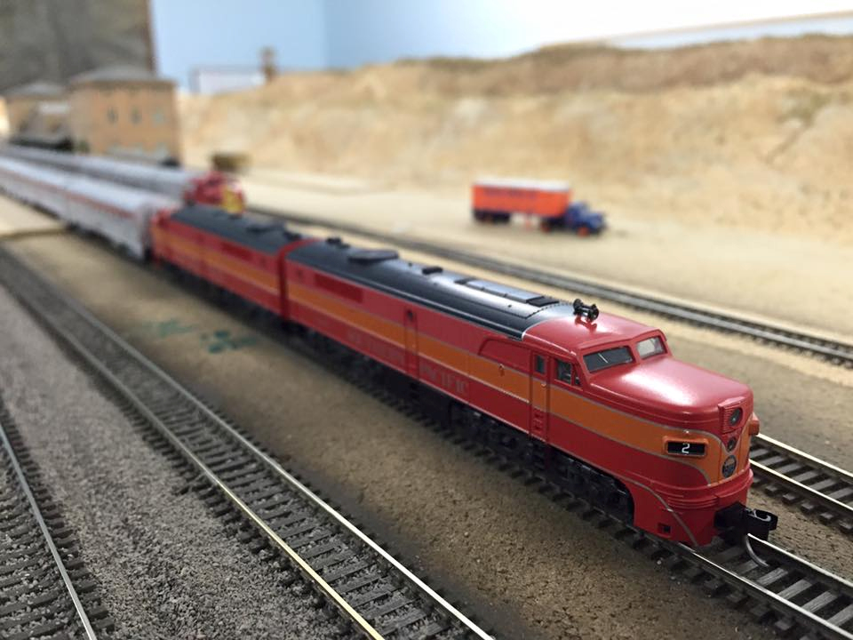 Welcome to the Los Angeles N-Scale Association, operators of East Valley Lines Model Railroad club located since 1979 in the Travel Town Museum at Griffith Los Angeles, California. View pitchers of the East Valley Lines N Scale Model Railroad club and see what they have done to their N scale layout. They operate one of the largest N-Scale layouts in the world. This is just a brief trip on the East Valley Lines' trackage. As you observe closely, there are lots of details to enjoy. This is truly a labor of love, involving countless hours, money and the talents of the many N-Scale modelers dedicated to the memory of great railroads. Brought to you to by www.krafttrains.com