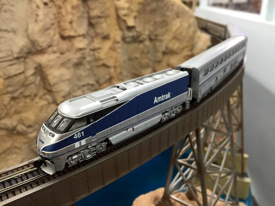 Welcome to the Los Angeles N-Scale Association, operators of East Valley Lines Model Railroad club located since 1979 in the Travel Town Museum at Griffith Los Angeles, California. View pitchers of the East Valley Lines N Scale Model Railroad club and see what they have done to their N scale layout. They operate one of the largest N-Scale layouts in the world. This is just a brief trip on the East Valley Lines' trackage. As you observe closely, there are lots of details to enjoy. This is truly a labor of love, involving countless hours, money and the talents of the many N-Scale modelers dedicated to the memory of great railroads. Brought to you to by www.krafttrains.com