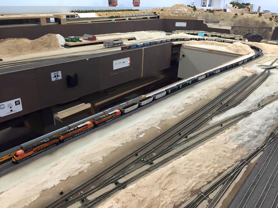 Welcome to the Los Angeles N-Scale Association, operators of East Valley Lines Model Railroad club located since 1979 in the Travel Town Museum at Griffith Los Angeles, California. View pitchers of the East Valley Lines N Scale Model Railroad club and see what they have done to their N scale layout. They operate one of the largest N-Scale layouts in the world. This is just a brief trip on the East Valley Lines' trackage. As you observe closely, there are lots of details to enjoy. This is truly a labor of love, involving countless hours, money and the talents of the many N-Scale modelers dedicated to the memory of great railroads. Brought to you to by www.krafttrains.com