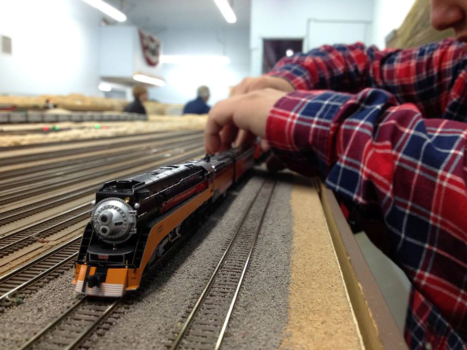 Welcome to the Los Angeles N-Scale Association, operators of East Valley Lines Model Railroad club located since 1979 in the Travel Town Museum at Griffith Los Angeles, California. View pitchers of the East Valley Lines N Scale Model Railroad club and see what they have done to their N scale layout. They operate one of the largest N-Scale layouts in the world. This is just a brief trip on the East Valley Lines' trackage. As you observe closely, there are lots of details to enjoy. This is truly a labor of love, involving countless hours, money and the talents of the many N-Scale modelers dedicated to the memory of great railroads. Brought to you to by www.krafttrains.com