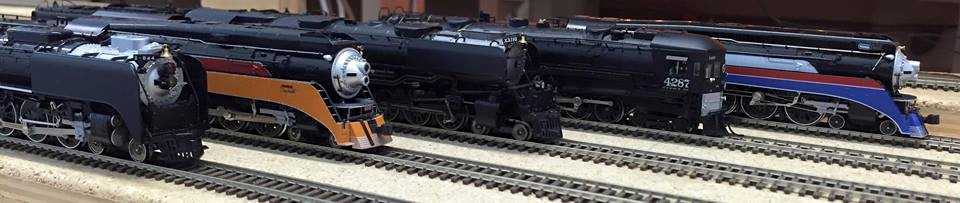 Welcome to the Los Angeles N-Scale Association, operators of East Valley Lines Model Railroad club located since 1979 in the Travel Town Museum at Griffith Los Angeles, California. View pitchers of the East Valley Lines N Scale Model Railroad club and see what they have done to their N scale layout. They operate one of the largest N-Scale layouts in the world. This is just a brief trip on the East Valley Lines' trackage. As you observe closely, there are lots of details to enjoy. This is truly a labor of love, involving countless hours, money and the talents of the many N-Scale modelers dedicated to the memory of great railroads. Brought to you to by www.krafttrains.com