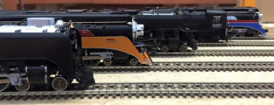 Welcome to the Los Angeles N-Scale Association, operators of East Valley Lines Model Railroad club located since 1979 in the Travel Town Museum at Griffith Los Angeles, California. View pitchers of the East Valley Lines N Scale Model Railroad club and see what they have done to their N scale layout. They operate one of the largest N-Scale layouts in the world. This is just a brief trip on the East Valley Lines' trackage. As you observe closely, there are lots of details to enjoy. This is truly a labor of love, involving countless hours, money and the talents of the many N-Scale modelers dedicated to the memory of great railroads. Brought to you to by www.krafttrains.com