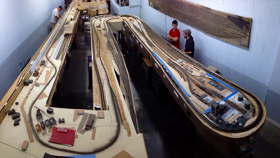 Welcome to the Los Angeles N-Scale Association, operators of East Valley Lines Model Railroad club located since 1979 in the Travel Town Museum at Griffith Los Angeles, California. View pitchers of the East Valley Lines N Scale Model Railroad club and see what they have done to their N scale layout. They operate one of the largest N-Scale layouts in the world. This is just a brief trip on the East Valley Lines' trackage. As you observe closely, there are lots of details to enjoy. This is truly a labor of love, involving countless hours, money and the talents of the many N-Scale modelers dedicated to the memory of great railroads. Brought to you to by www.krafttrains.com