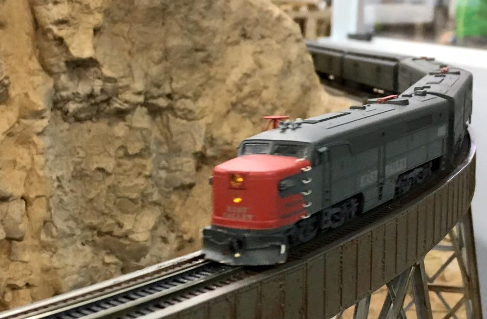 Welcome to the Los Angeles N-Scale Association, operators of East Valley Lines Model Railroad club located since 1979 in the Travel Town Museum at Griffith Los Angeles, California. View pitchers of the East Valley Lines N Scale Model Railroad club and see what they have done to their N scale layout. They operate one of the largest N-Scale layouts in the world. This is just a brief trip on the East Valley Lines' trackage. As you observe closely, there are lots of details to enjoy. This is truly a labor of love, involving countless hours, money and the talents of the many N-Scale modelers dedicated to the memory of great railroads. Brought to you to by www.krafttrains.com
