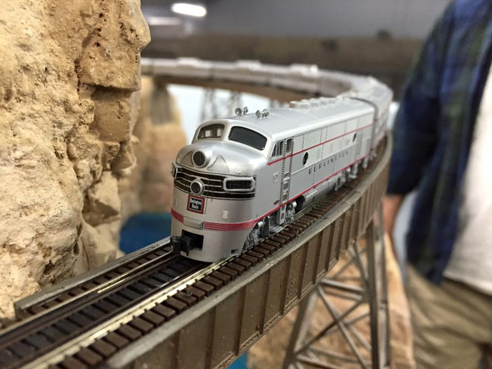 Welcome to the Los Angeles N-Scale Association, operators of East Valley Lines Model Railroad club located since 1979 in the Travel Town Museum at Griffith Los Angeles, California. View pitchers of the East Valley Lines N Scale Model Railroad club and see what they have done to their N scale layout. They operate one of the largest N-Scale layouts in the world. This is just a brief trip on the East Valley Lines' trackage. As you observe closely, there are lots of details to enjoy. This is truly a labor of love, involving countless hours, money and the talents of the many N-Scale modelers dedicated to the memory of great railroads. Brought to you to by www.krafttrains.com