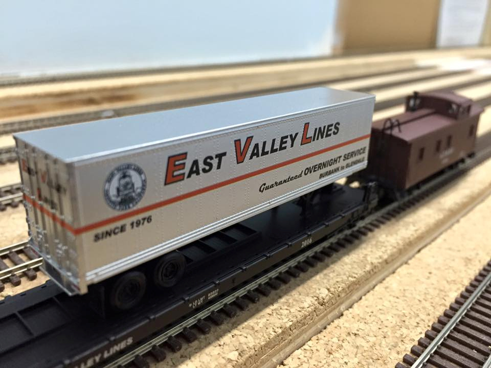 Welcome to the Los Angeles N-Scale Association, operators of East Valley Lines Model Railroad club located since 1979 in the Travel Town Museum at Griffith Los Angeles, California. View pitchers of the East Valley Lines N Scale Model Railroad club and see what they have done to their N scale layout. They operate one of the largest N-Scale layouts in the world. This is just a brief trip on the East Valley Lines' trackage. As you observe closely, there are lots of details to enjoy. This is truly a labor of love, involving countless hours, money and the talents of the many N-Scale modelers dedicated to the memory of great railroads. Brought to you to by www.krafttrains.com