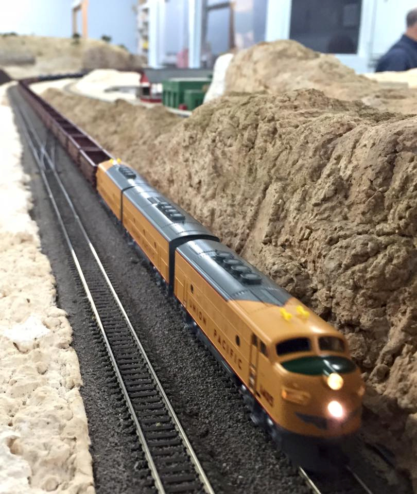 Welcome to the Los Angeles N-Scale Association, operators of East Valley Lines Model Railroad club located since 1979 in the Travel Town Museum at Griffith Los Angeles, California. View pitchers of the East Valley Lines N Scale Model Railroad club and see what they have done to their N scale layout. They operate one of the largest N-Scale layouts in the world. This is just a brief trip on the East Valley Lines' trackage. As you observe closely, there are lots of details to enjoy. This is truly a labor of love, involving countless hours, money and the talents of the many N-Scale modelers dedicated to the memory of great railroads. Brought to you to by www.krafttrains.com