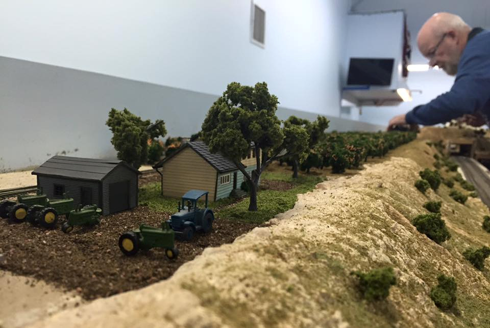 Welcome to the Los Angeles N-Scale Association, operators of East Valley Lines Model Railroad club located since 1979 in the Travel Town Museum at Griffith Los Angeles, California. View pitchers of the East Valley Lines N Scale Model Railroad club and see what they have done to their N scale layout. They operate one of the largest N-Scale layouts in the world. This is just a brief trip on the East Valley Lines' trackage. As you observe closely, there are lots of details to enjoy. This is truly a labor of love, involving countless hours, money and the talents of the many N-Scale modelers dedicated to the memory of great railroads. Brought to you to by www.krafttrains.com