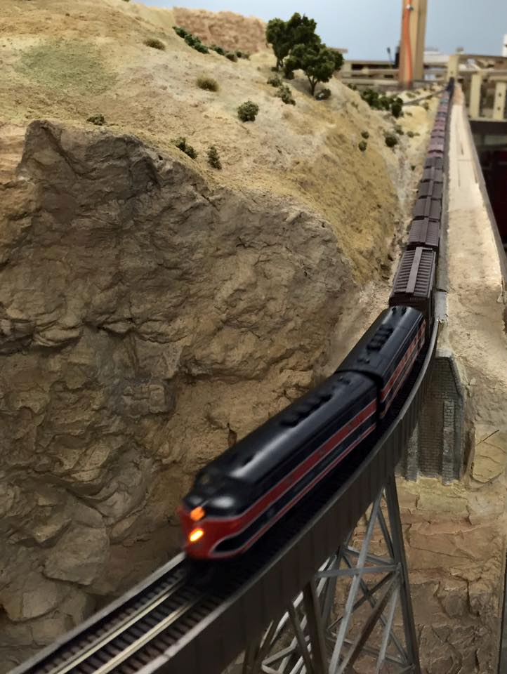 Welcome to the Los Angeles N-Scale Association, operators of East Valley Lines Model Railroad club located since 1979 in the Travel Town Museum at Griffith Los Angeles, California. View pitchers of the East Valley Lines N Scale Model Railroad club and see what they have done to their N scale layout. They operate one of the largest N-Scale layouts in the world. This is just a brief trip on the East Valley Lines' trackage. As you observe closely, there are lots of details to enjoy. This is truly a labor of love, involving countless hours, money and the talents of the many N-Scale modelers dedicated to the memory of great railroads. Brought to you to by www.krafttrains.com