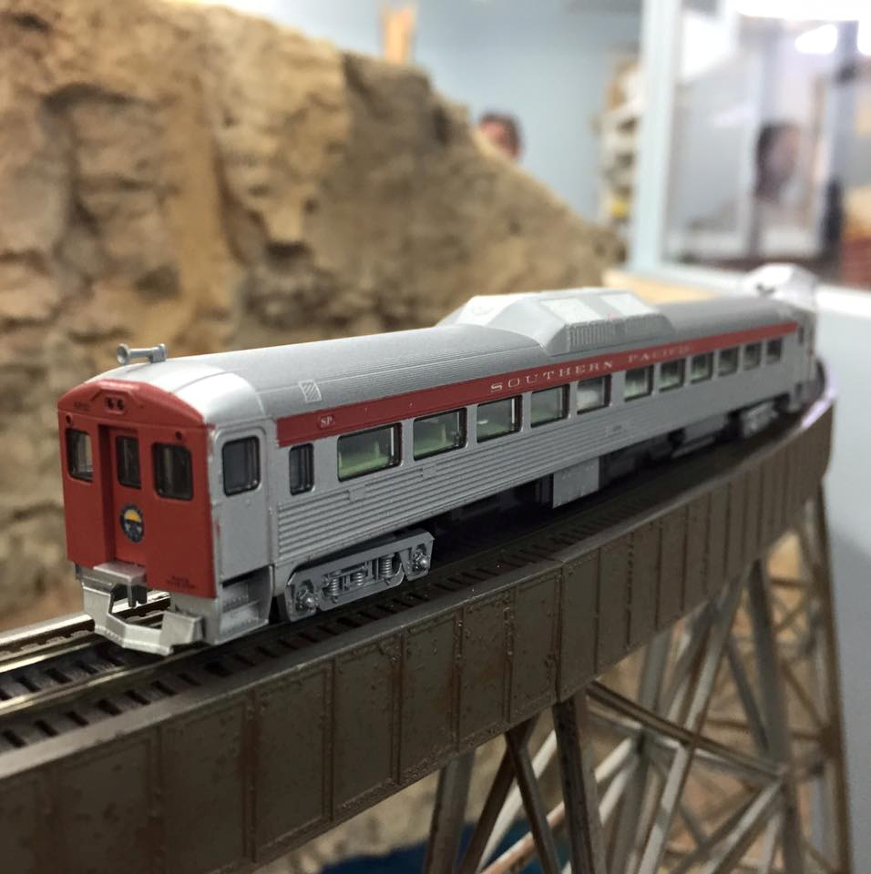 Welcome to the Los Angeles N-Scale Association, operators of East Valley Lines Model Railroad club located since 1979 in the Travel Town Museum at Griffith Los Angeles, California. View pitchers of the East Valley Lines N Scale Model Railroad club and see what they have done to their N scale layout. They operate one of the largest N-Scale layouts in the world. This is just a brief trip on the East Valley Lines' trackage. As you observe closely, there are lots of details to enjoy. This is truly a labor of love, involving countless hours, money and the talents of the many N-Scale modelers dedicated to the memory of great railroads. Brought to you to by www.krafttrains.com