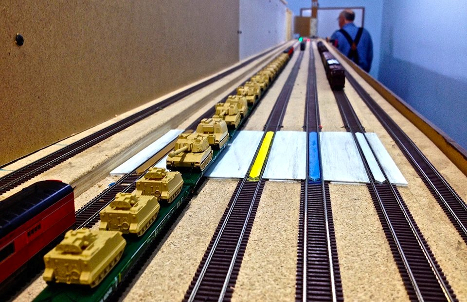 Welcome to the Los Angeles N-Scale Association, operators of East Valley Lines Model Railroad club located since 1979 in the Travel Town Museum at Griffith Los Angeles, California. View pitchers of the East Valley Lines N Scale Model Railroad club and see what they have done to their N scale layout. They operate one of the largest N-Scale layouts in the world. This is just a brief trip on the East Valley Lines' trackage. As you observe closely, there are lots of details to enjoy. This is truly a labor of love, involving countless hours, money and the talents of the many N-Scale modelers dedicated to the memory of great railroads. Brought to you to by www.krafttrains.com