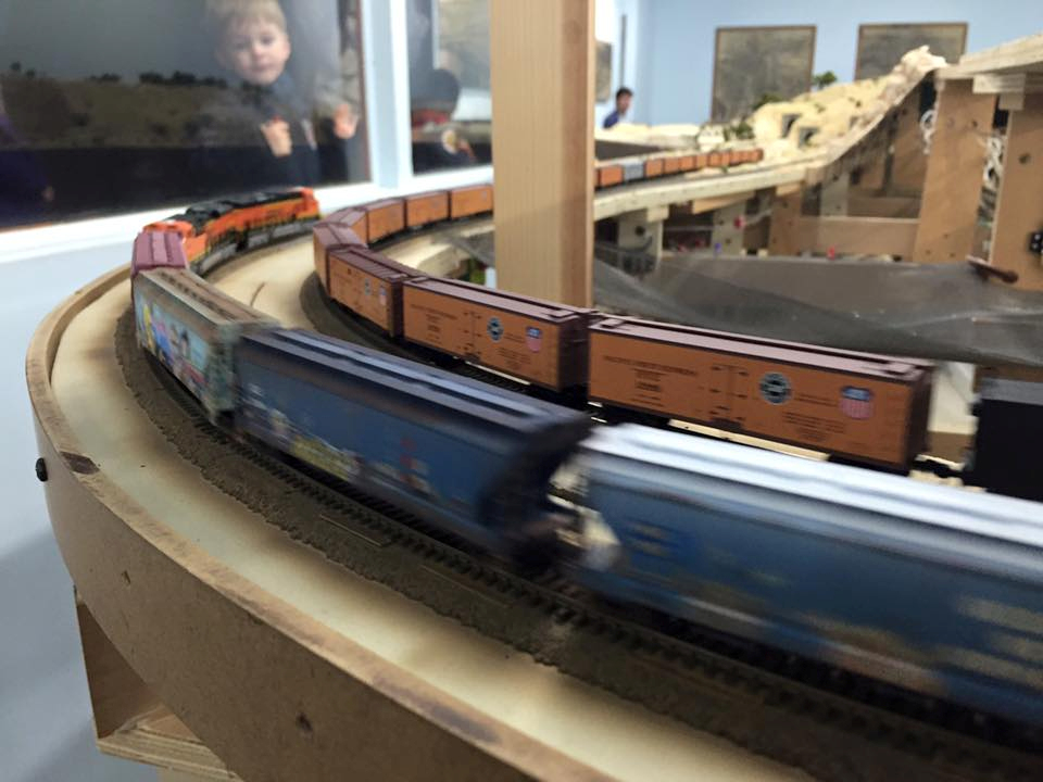 Welcome to the Los Angeles N-Scale Association, operators of East Valley Lines Model Railroad club located since 1979 in the Travel Town Museum at Griffith Los Angeles, California. View pitchers of the East Valley Lines N Scale Model Railroad club and see what they have done to their N scale layout. They operate one of the largest N-Scale layouts in the world. This is just a brief trip on the East Valley Lines' trackage. As you observe closely, there are lots of details to enjoy. This is truly a labor of love, involving countless hours, money and the talents of the many N-Scale modelers dedicated to the memory of great railroads. Brought to you to by www.krafttrains.com