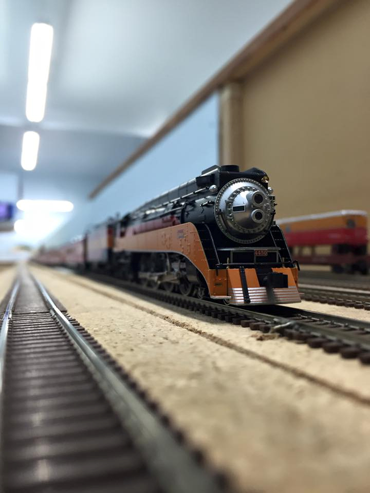 Welcome to the Los Angeles N-Scale Association, operators of East Valley Lines Model Railroad club located since 1979 in the Travel Town Museum at Griffith Los Angeles, California. View pitchers of the East Valley Lines N Scale Model Railroad club and see what they have done to their N scale layout. They operate one of the largest N-Scale layouts in the world. This is just a brief trip on the East Valley Lines' trackage. As you observe closely, there are lots of details to enjoy. This is truly a labor of love, involving countless hours, money and the talents of the many N-Scale modelers dedicated to the memory of great railroads. Brought to you to by www.krafttrains.com