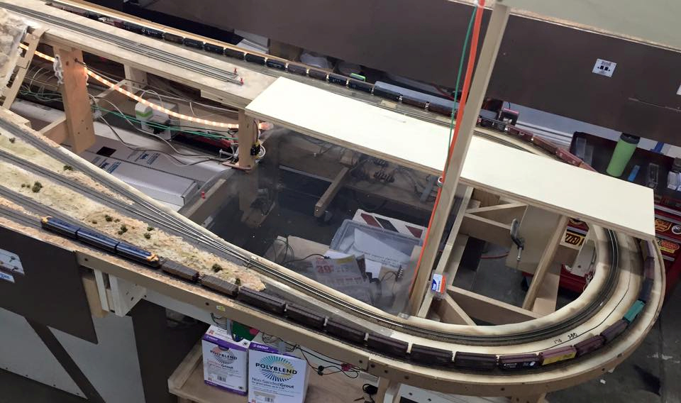 Welcome to the Los Angeles N-Scale Association, operators of East Valley Lines Model Railroad club located since 1979 in the Travel Town Museum at Griffith Los Angeles, California. View pitchers of the East Valley Lines N Scale Model Railroad club and see what they have done to their N scale layout. They operate one of the largest N-Scale layouts in the world. This is just a brief trip on the East Valley Lines' trackage. As you observe closely, there are lots of details to enjoy. This is truly a labor of love, involving countless hours, money and the talents of the many N-Scale modelers dedicated to the memory of great railroads. Brought to you to by www.krafttrains.com