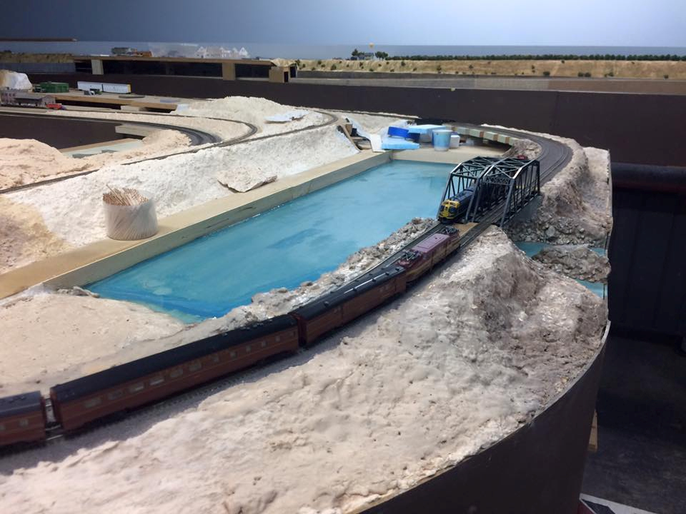 Welcome to the Los Angeles N-Scale Association, operators of East Valley Lines Model Railroad club located since 1979 in the Travel Town Museum at Griffith Los Angeles, California. View pitchers of the East Valley Lines N Scale Model Railroad club and see what they have done to their N scale layout. They operate one of the largest N-Scale layouts in the world. This is just a brief trip on the East Valley Lines' trackage. As you observe closely, there are lots of details to enjoy. This is truly a labor of love, involving countless hours, money and the talents of the many N-Scale modelers dedicated to the memory of great railroads. Brought to you to by www.krafttrains.com