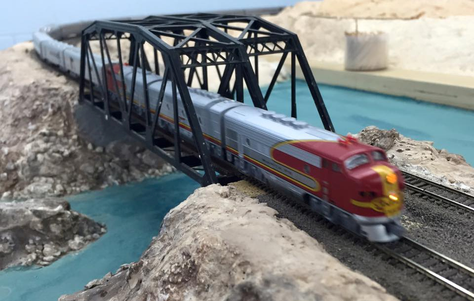 Welcome to the Los Angeles N-Scale Association, operators of East Valley Lines Model Railroad club located since 1979 in the Travel Town Museum at Griffith Los Angeles, California. View pitchers of the East Valley Lines N Scale Model Railroad club and see what they have done to their N scale layout. They operate one of the largest N-Scale layouts in the world. This is just a brief trip on the East Valley Lines' trackage. As you observe closely, there are lots of details to enjoy. This is truly a labor of love, involving countless hours, money and the talents of the many N-Scale modelers dedicated to the memory of great railroads. Brought to you to by www.krafttrains.com