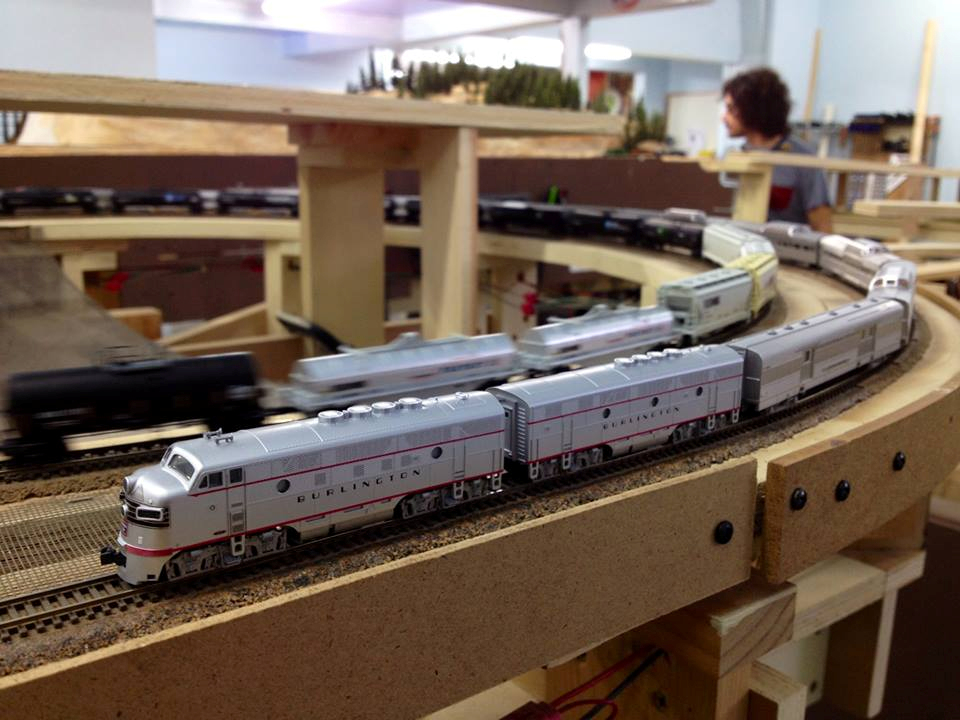 Welcome to the Los Angeles N-Scale Association, operators of East Valley Lines Model Railroad club located since 1979 in the Travel Town Museum at Griffith Los Angeles, California. View pitchers of the East Valley Lines N Scale Model Railroad club and see what they have done to their N scale layout. They operate one of the largest N-Scale layouts in the world. This is just a brief trip on the East Valley Lines' trackage. As you observe closely, there are lots of details to enjoy. This is truly a labor of love, involving countless hours, money and the talents of the many N-Scale modelers dedicated to the memory of great railroads. Brought to you to by www.krafttrains.com