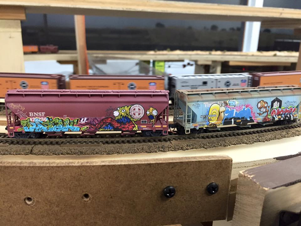 Welcome to the Los Angeles N-Scale Association, operators of East Valley Lines Model Railroad club located since 1979 in the Travel Town Museum at Griffith Los Angeles, California. View pitchers of the East Valley Lines N Scale Model Railroad club and see what they have done to their N scale layout. They operate one of the largest N-Scale layouts in the world. This is just a brief trip on the East Valley Lines' trackage. As you observe closely, there are lots of details to enjoy. This is truly a labor of love, involving countless hours, money and the talents of the many N-Scale modelers dedicated to the memory of great railroads. Brought to you to by www.krafttrains.com