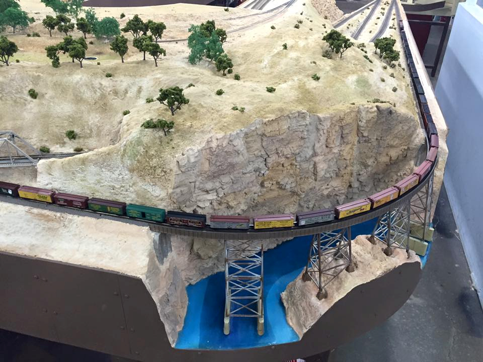 Welcome to the Los Angeles N-Scale Association, operators of East Valley Lines Model Railroad club located since 1979 in the Travel Town Museum at Griffith Los Angeles, California. View pitchers of the East Valley Lines N Scale Model Railroad club and see what they have done to their N scale layout. They operate one of the largest N-Scale layouts in the world. This is just a brief trip on the East Valley Lines' trackage. As you observe closely, there are lots of details to enjoy. This is truly a labor of love, involving countless hours, money and the talents of the many N-Scale modelers dedicated to the memory of great railroads. Brought to you to by www.krafttrains.com