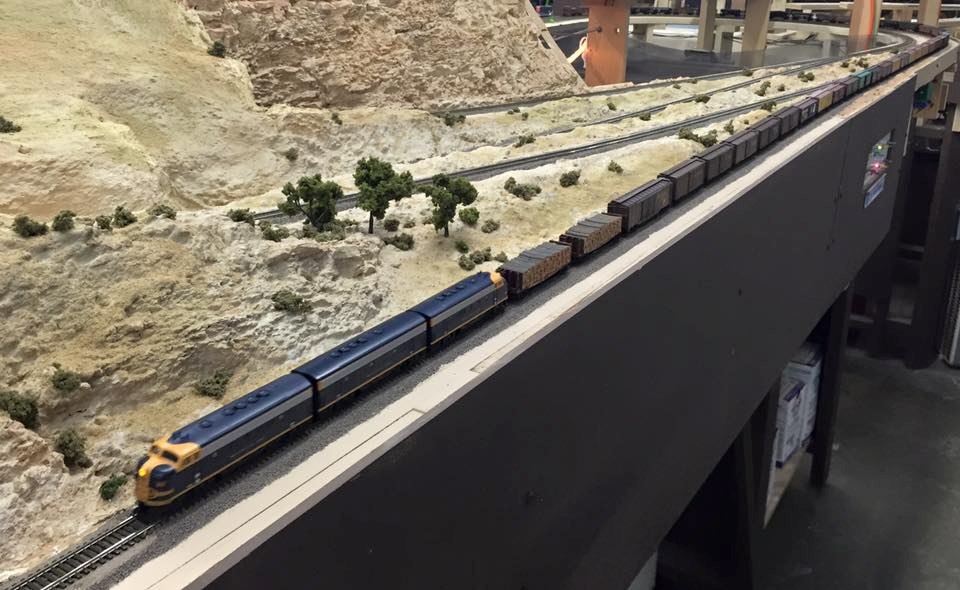 Welcome to the Los Angeles N-Scale Association, operators of East Valley Lines Model Railroad club located since 1979 in the Travel Town Museum at Griffith Los Angeles, California. View pitchers of the East Valley Lines N Scale Model Railroad club and see what they have done to their N scale layout. They operate one of the largest N-Scale layouts in the world. This is just a brief trip on the East Valley Lines' trackage. As you observe closely, there are lots of details to enjoy. This is truly a labor of love, involving countless hours, money and the talents of the many N-Scale modelers dedicated to the memory of great railroads. Brought to you to by www.krafttrains.com