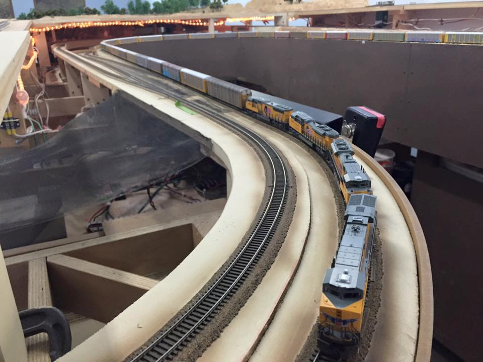 Welcome to the Los Angeles N-Scale Association, operators of East Valley Lines Model Railroad club located since 1979 in the Travel Town Museum at Griffith Los Angeles, California. View pitchers of the East Valley Lines N Scale Model Railroad club and see what they have done to their N scale layout. They operate one of the largest N-Scale layouts in the world. This is just a brief trip on the East Valley Lines' trackage. As you observe closely, there are lots of details to enjoy. This is truly a labor of love, involving countless hours, money and the talents of the many N-Scale modelers dedicated to the memory of great railroads. Brought to you to by www.krafttrains.com