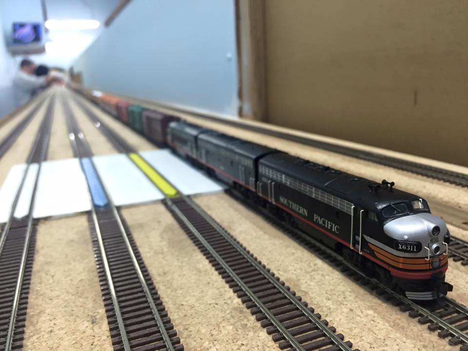 Welcome to the Los Angeles N-Scale Association, operators of East Valley Lines Model Railroad club located since 1979 in the Travel Town Museum at Griffith Los Angeles, California. View pitchers of the East Valley Lines N Scale Model Railroad club and see what they have done to their N scale layout. They operate one of the largest N-Scale layouts in the world. This is just a brief trip on the East Valley Lines' trackage. As you observe closely, there are lots of details to enjoy. This is truly a labor of love, involving countless hours, money and the talents of the many N-Scale modelers dedicated to the memory of great railroads. Brought to you to by www.krafttrains.com